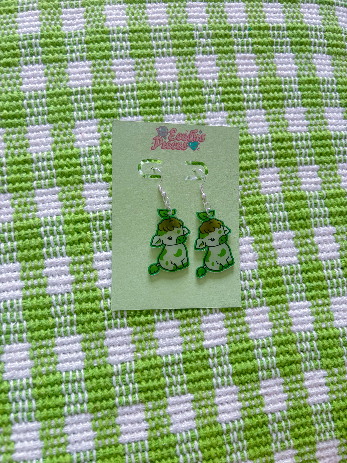 Plant cow earrings