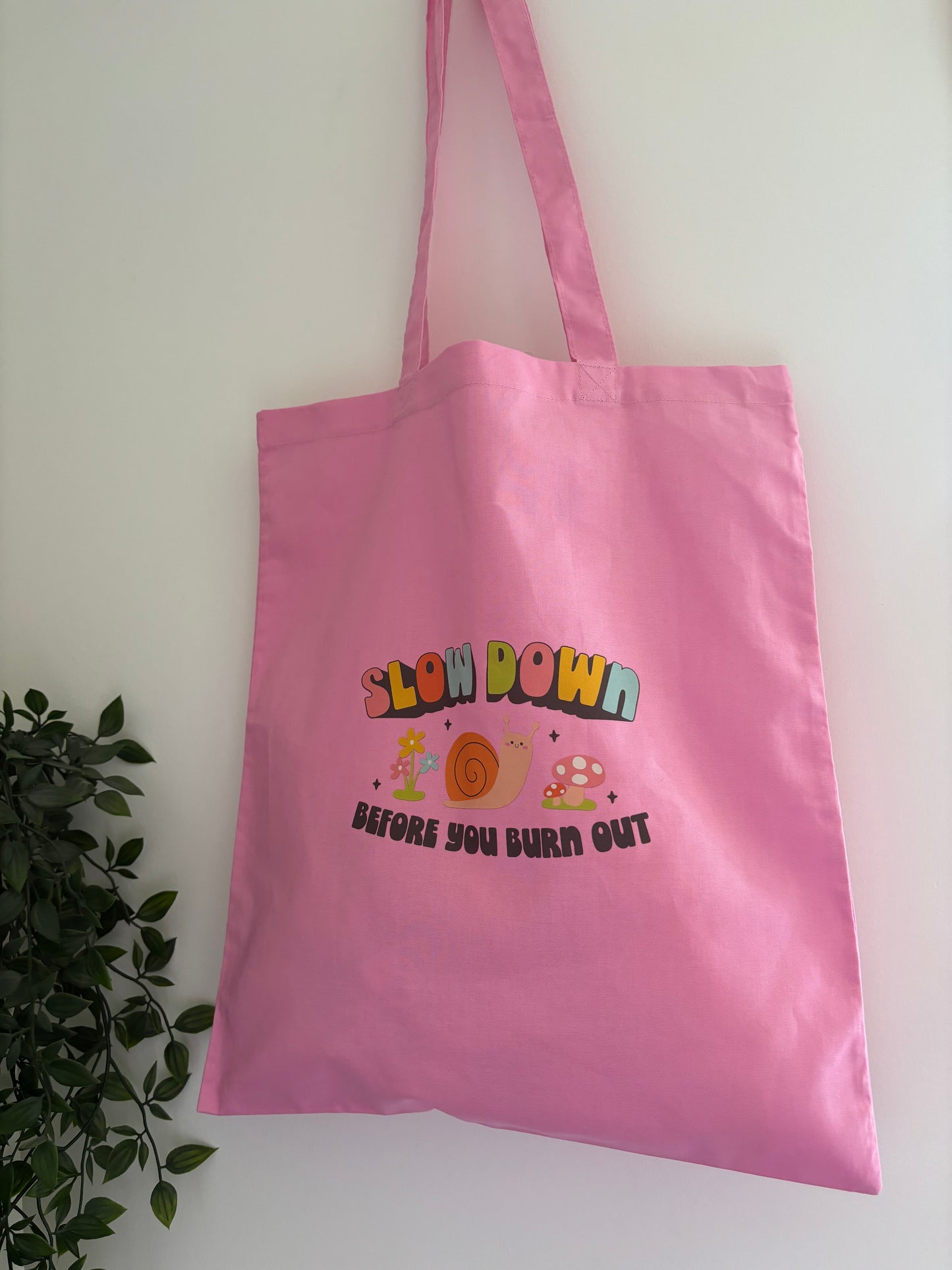 Snail progress tote bag