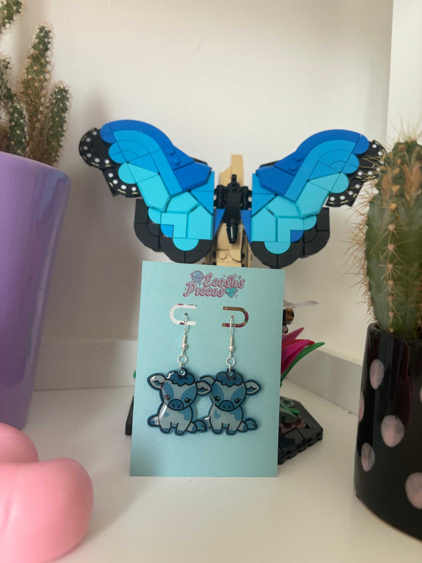 Blueberry cow earrings
