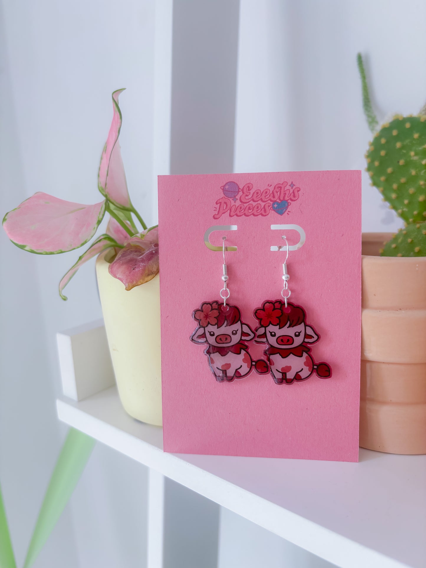 Sakura cow earrings