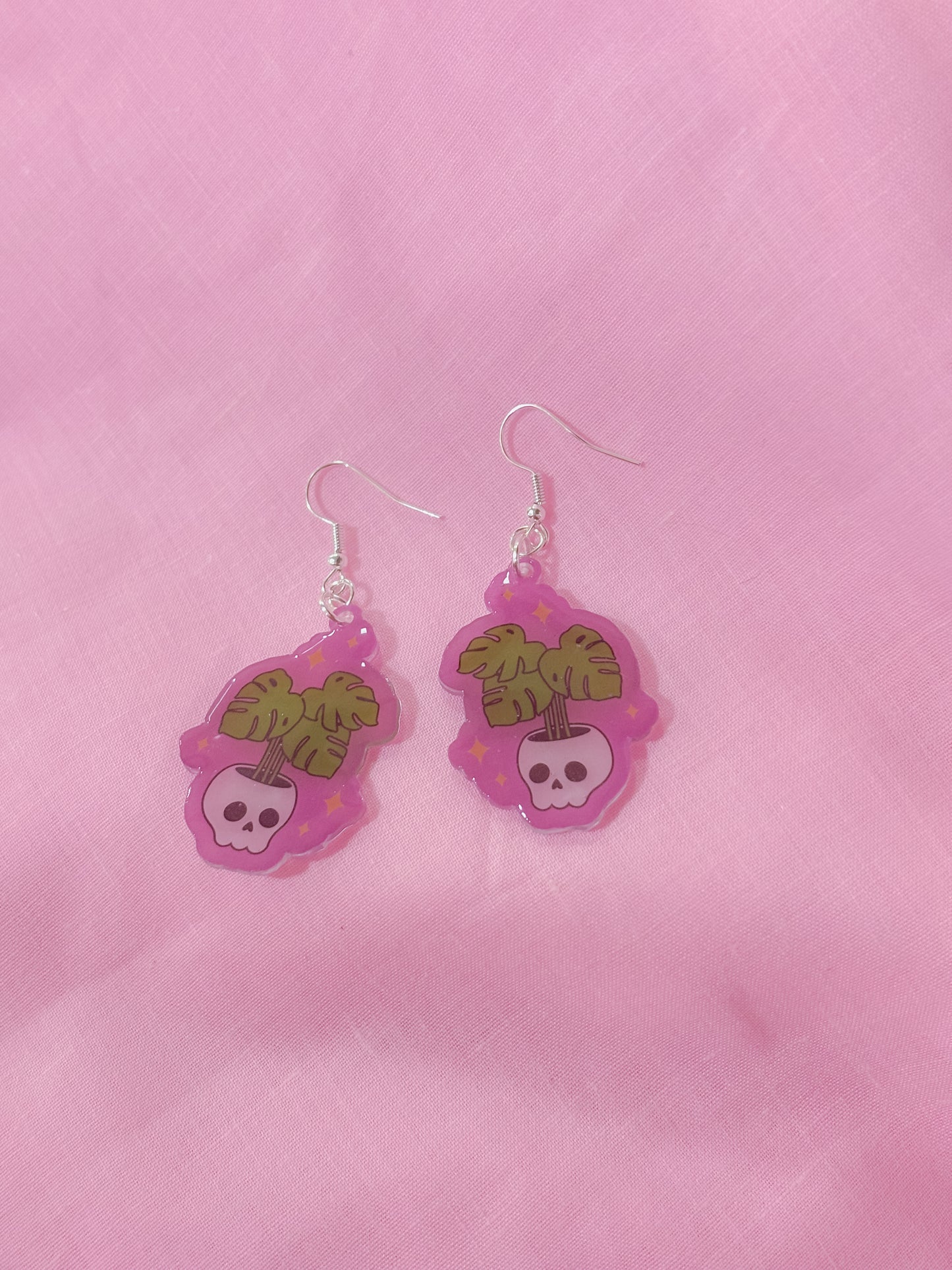 Spooky skull plant earrings
