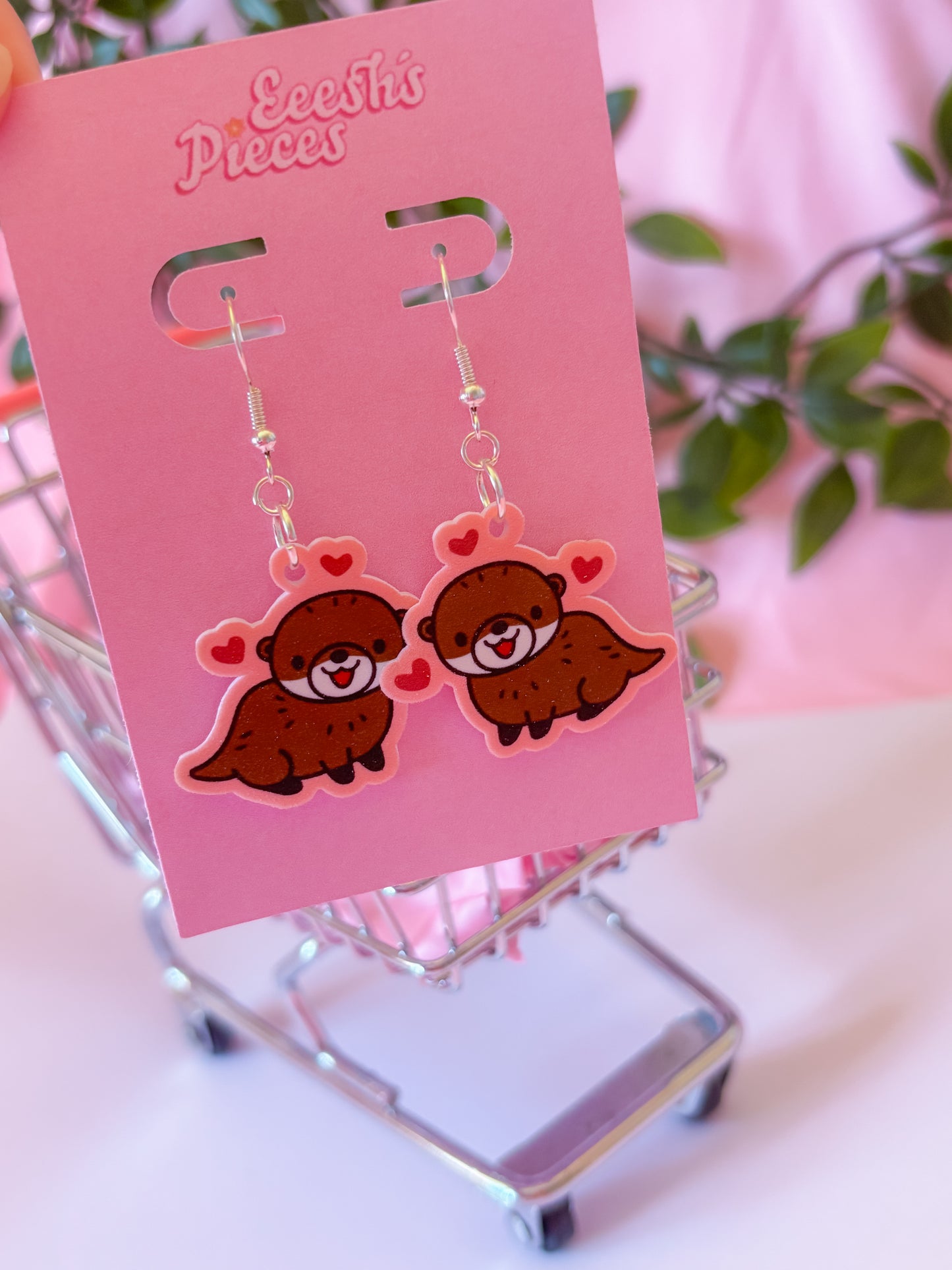 Heart otter earrings