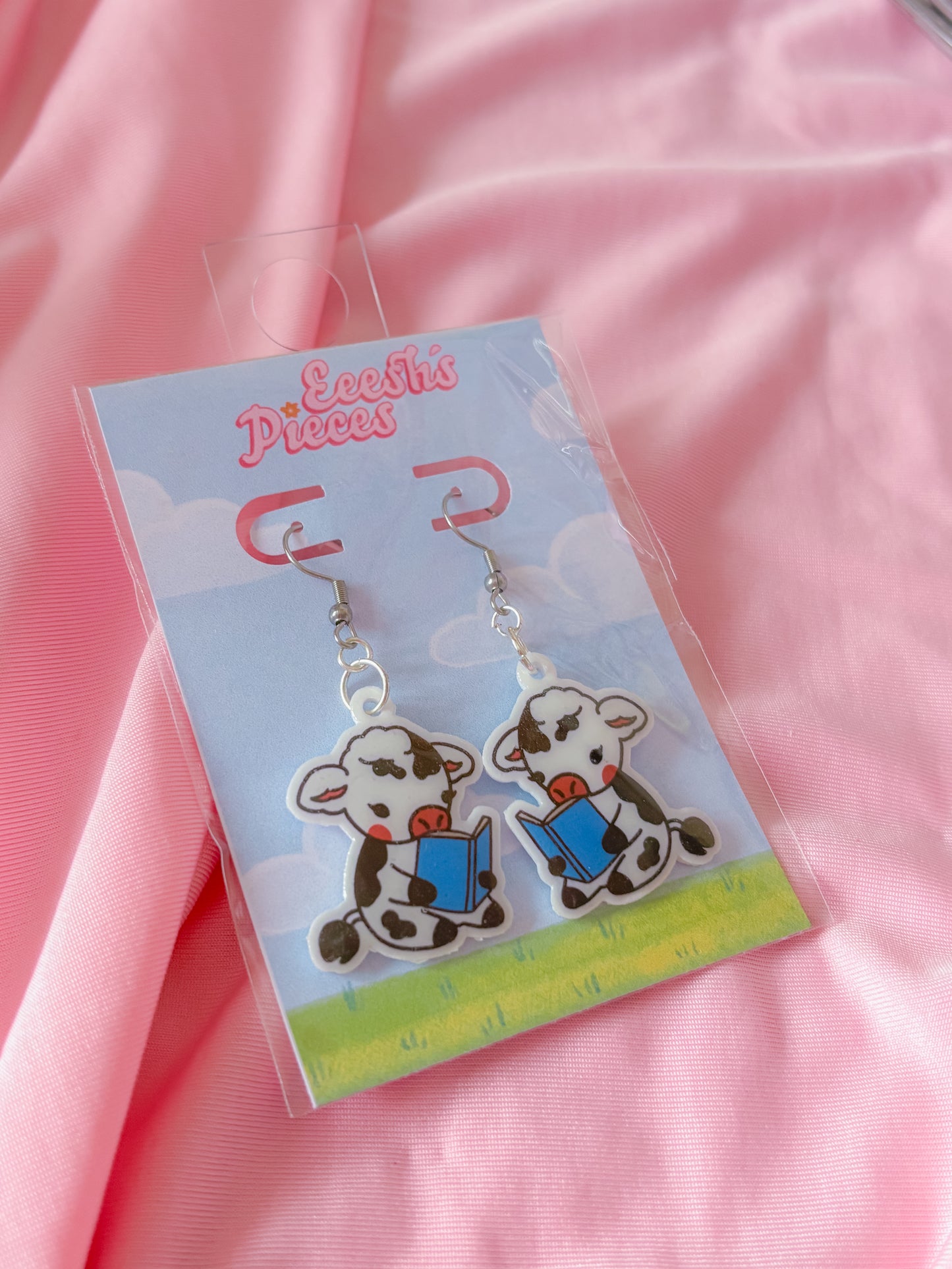 Bookish cow earrings
