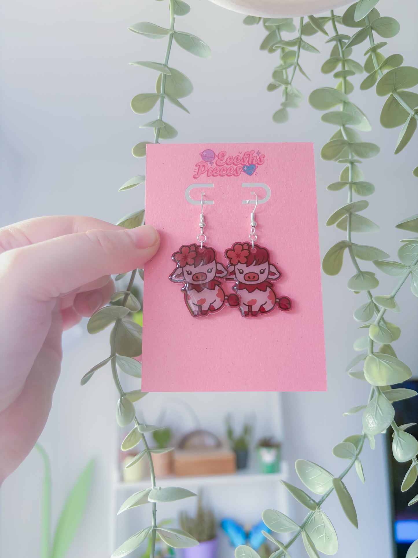 Sakura cow earrings