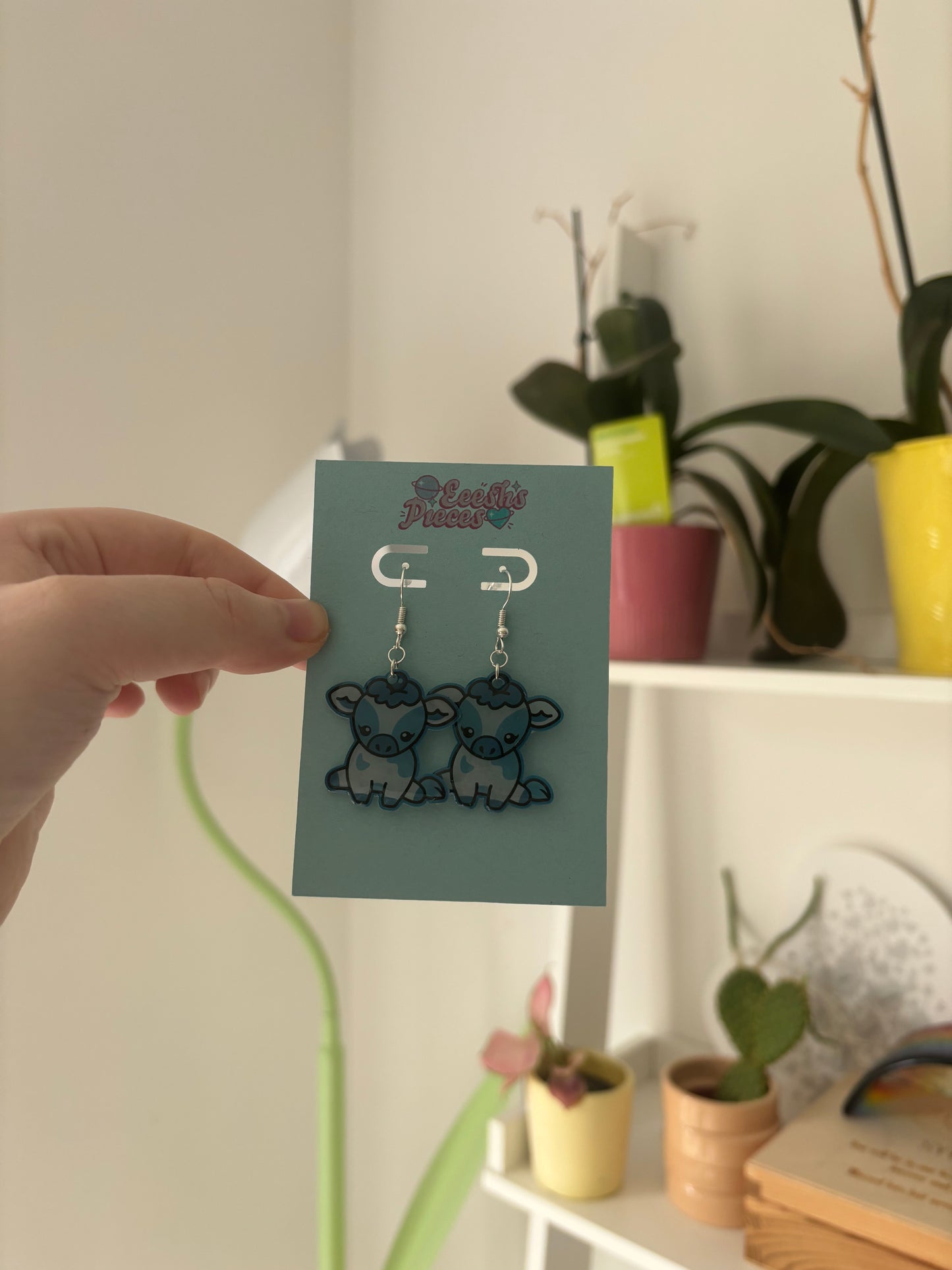 Blueberry cow earrings
