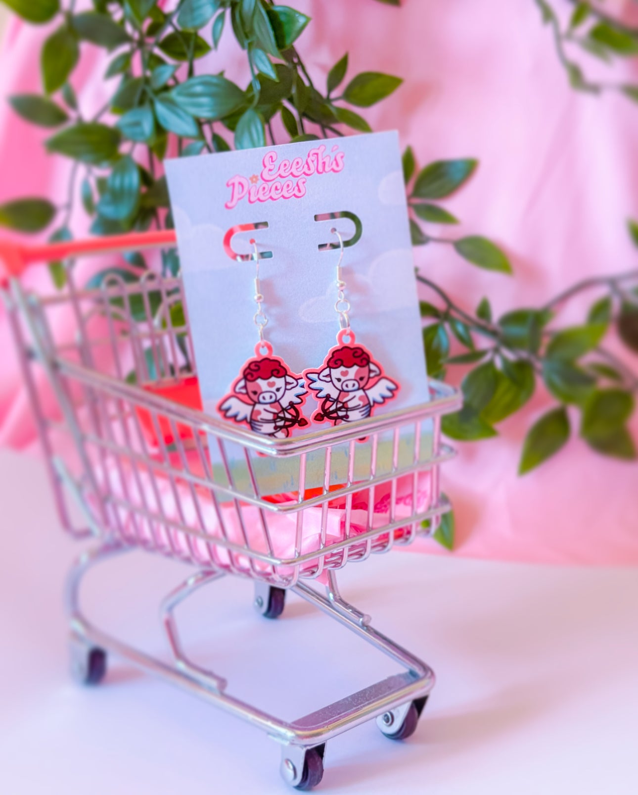 Cupid cow earrings