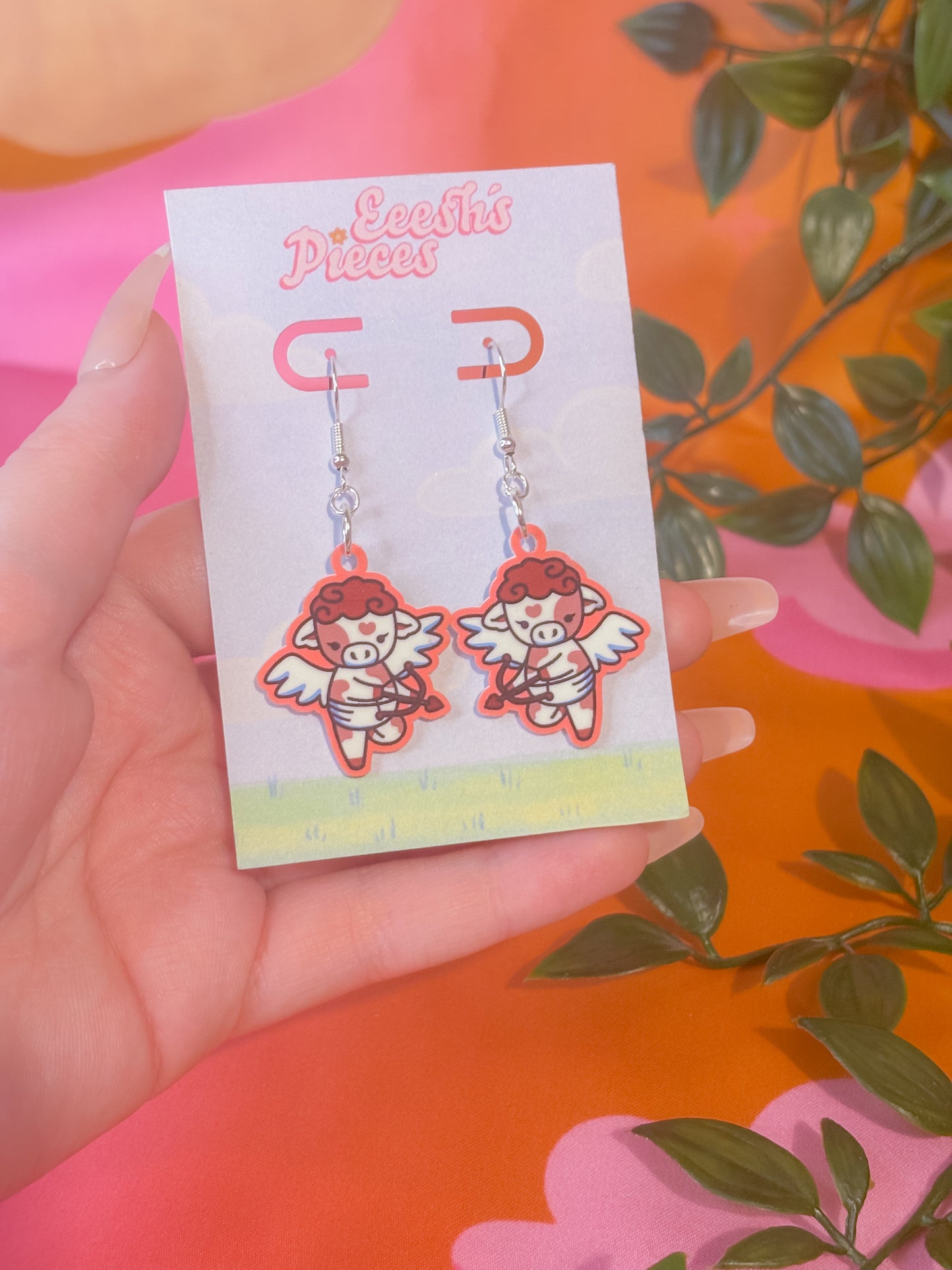 Cupid cow earrings