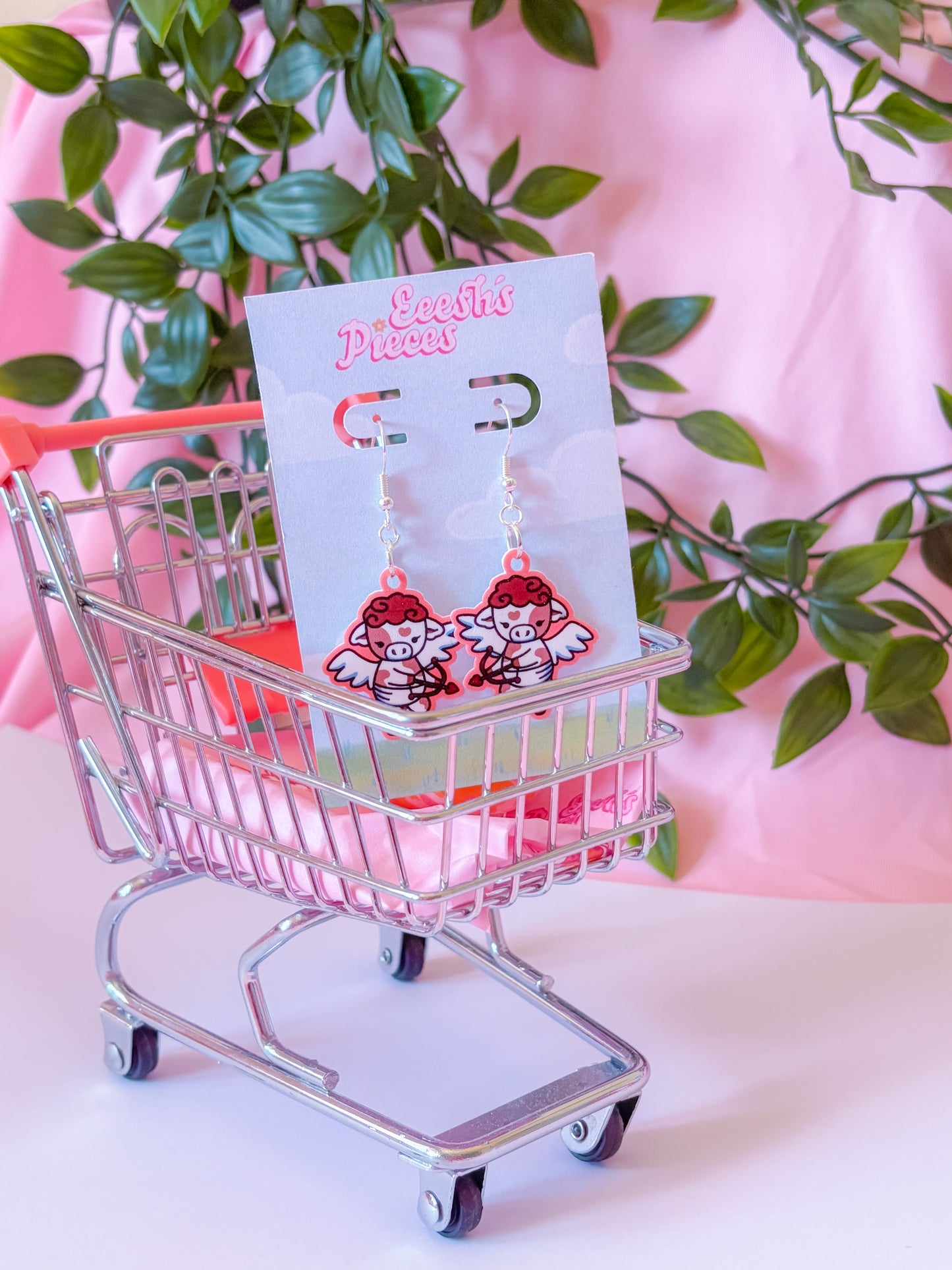 Cupid cow earrings