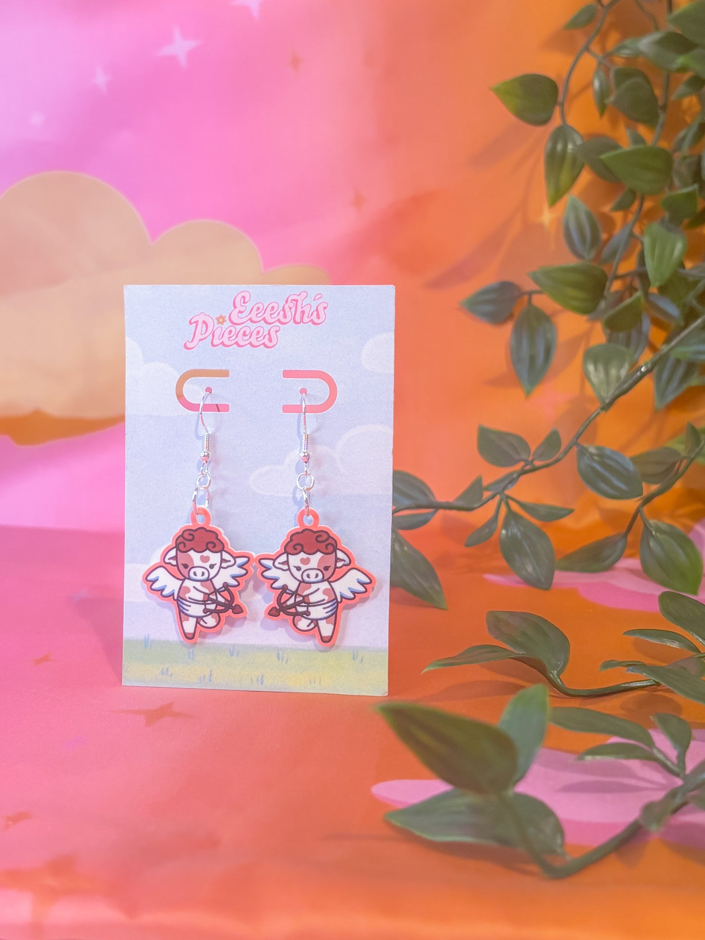 Cupid cow earrings