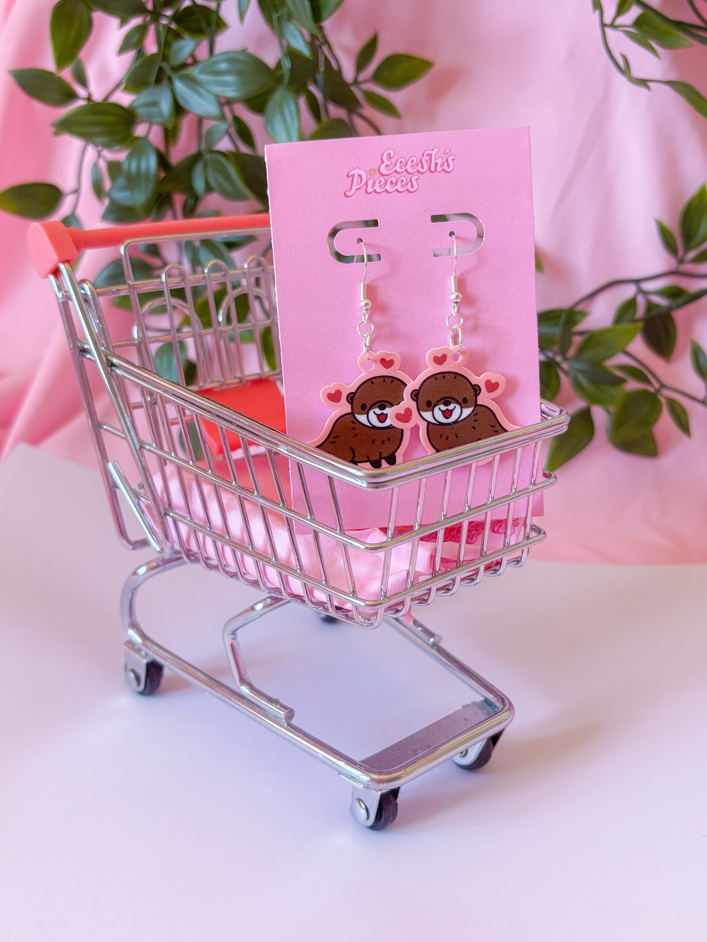 Heart otter earrings