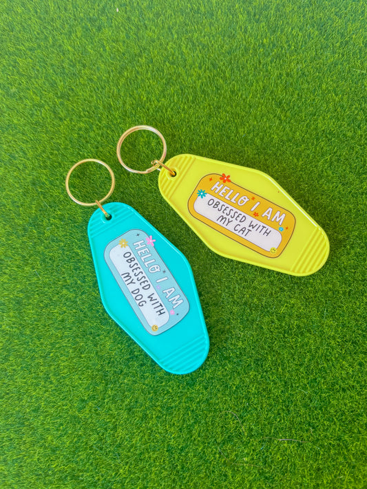 Pet obsessed motel keyring