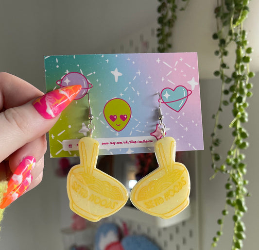 Yellow ‘send n00ds’ ramen earrings